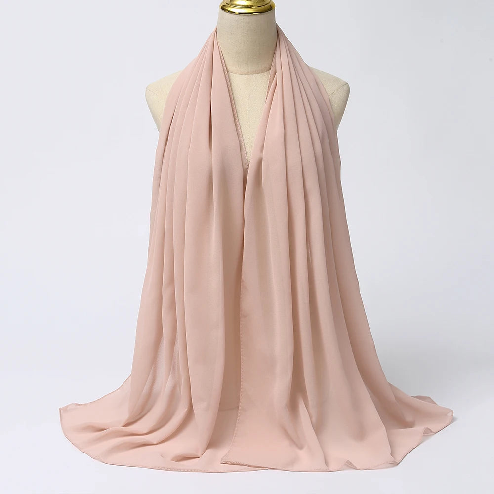 Long solid-color chiffon hijab — lightweight and elegant.