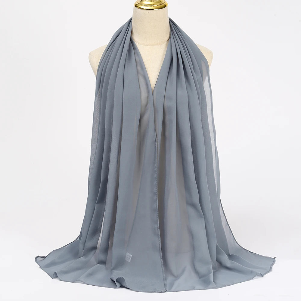 Long solid-color chiffon hijab — lightweight and elegant.