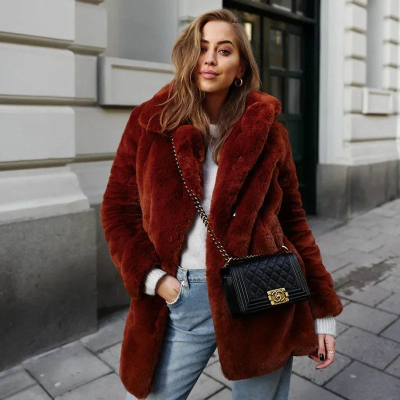 Mid-length faux fur coat — warm, plush, and stylish for winter.