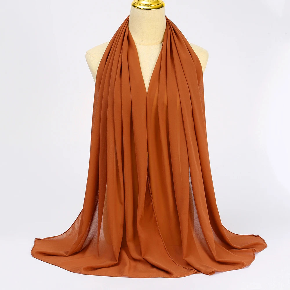 Long solid-color chiffon hijab — lightweight and elegant.