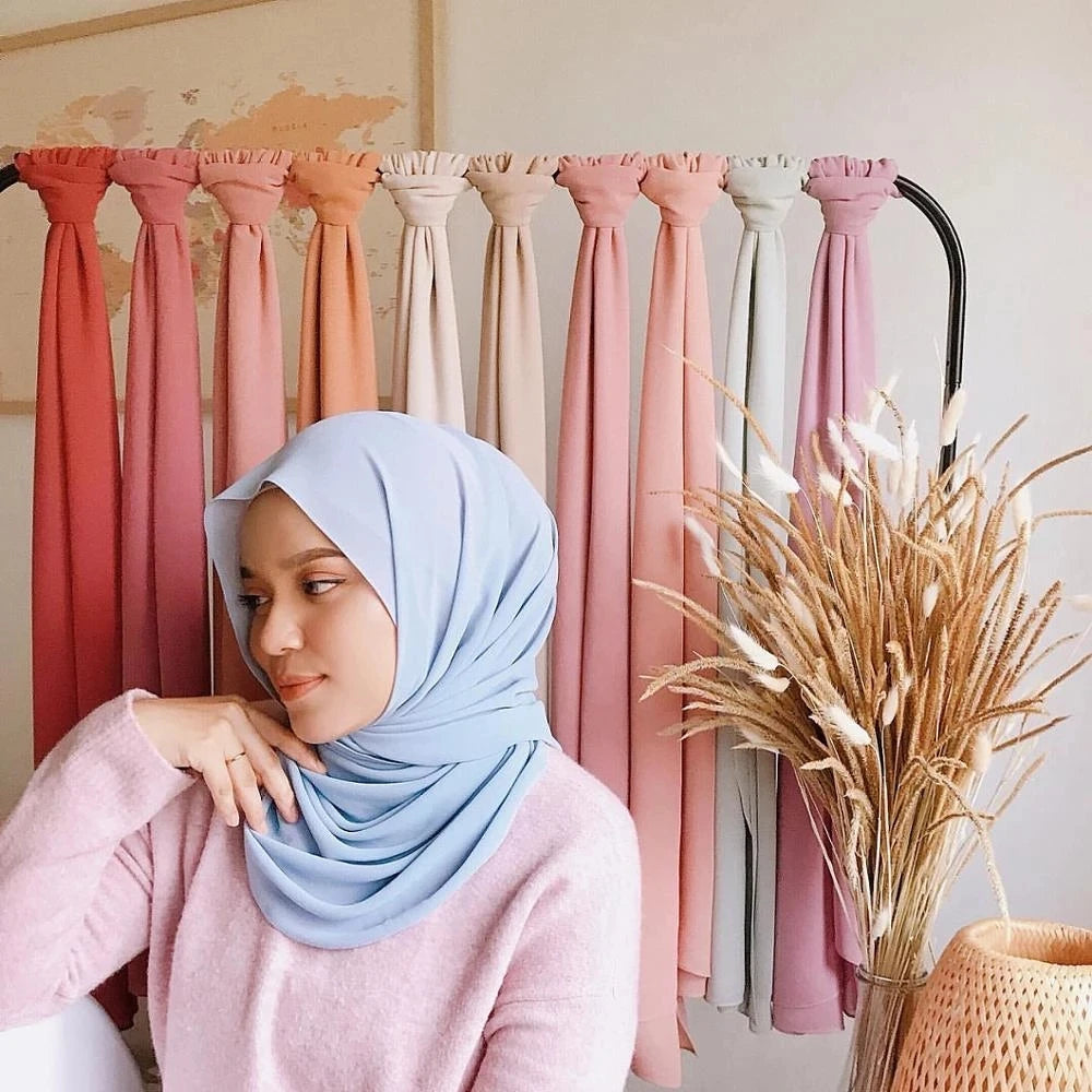 Long solid-color chiffon hijab — lightweight and elegant.
