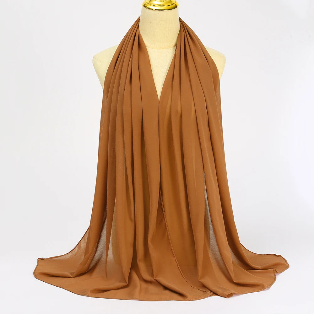 Long solid-color chiffon hijab — lightweight and elegant.
