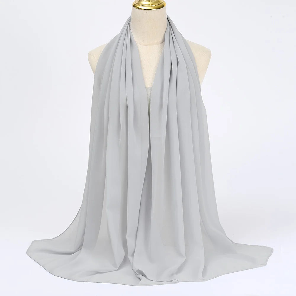 Long solid-color chiffon hijab — lightweight and elegant.