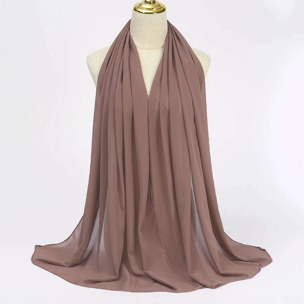 Long solid-color chiffon hijab — lightweight and elegant.