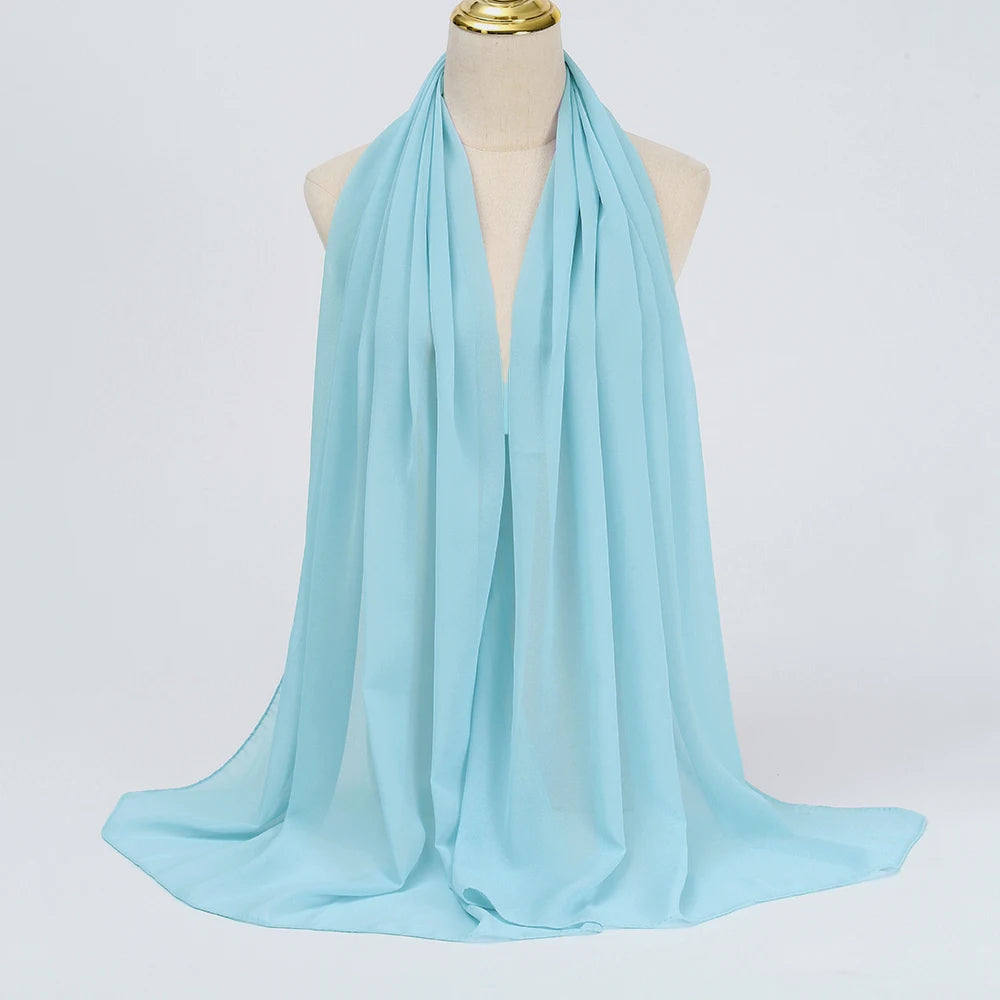 Long solid-color chiffon hijab — lightweight and elegant.