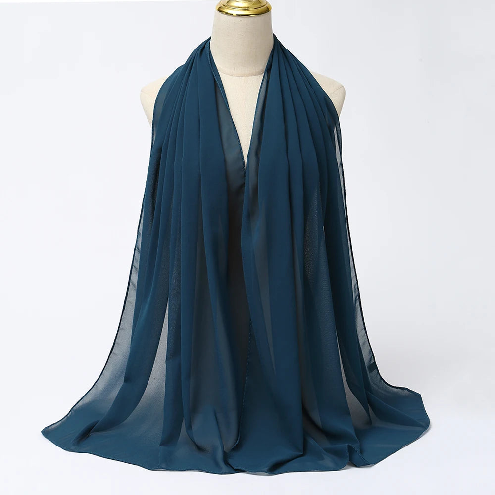 Long solid-color chiffon hijab — lightweight and elegant.