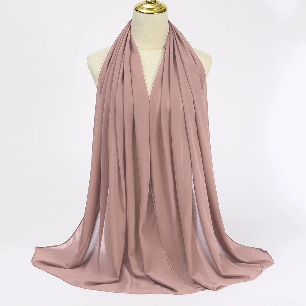 Long solid-color chiffon hijab — lightweight and elegant.