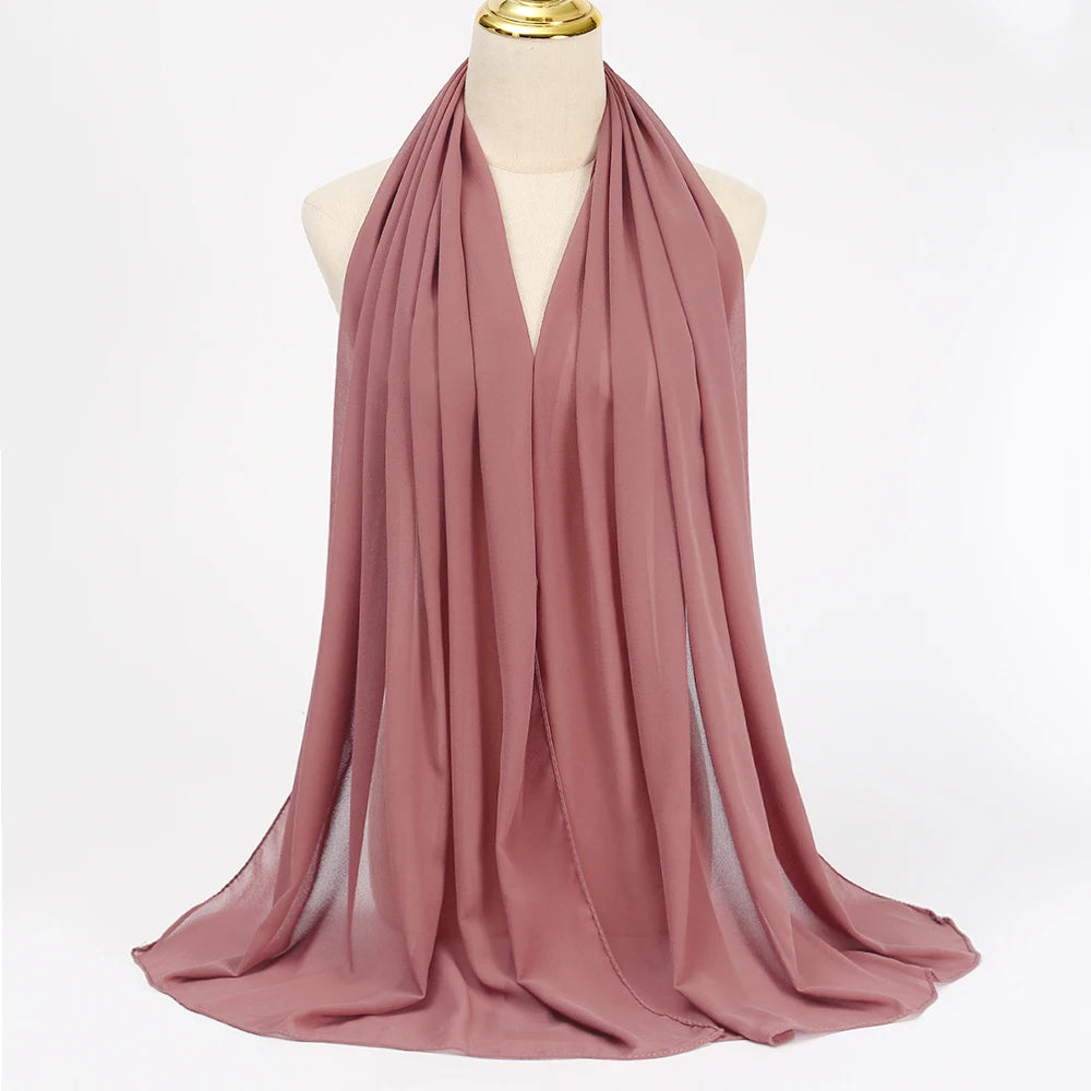 Long solid-color chiffon hijab — lightweight and elegant.