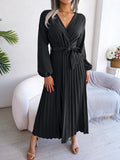 Elegant V-neck pleated maxi dress with long sleeves.