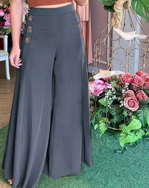 Elegant high-waist wide-leg pants with buttons — stylish and versatile for spring.