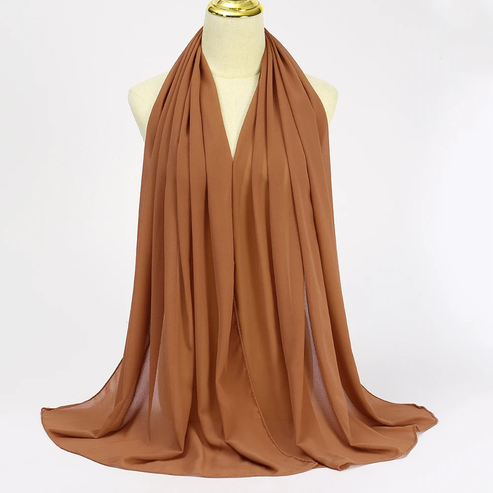 Long solid-color chiffon hijab — lightweight and elegant.