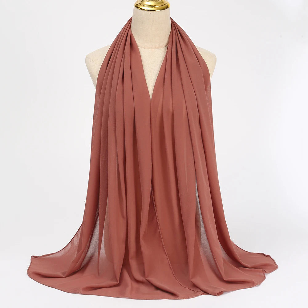 Long solid-color chiffon hijab — lightweight and elegant.