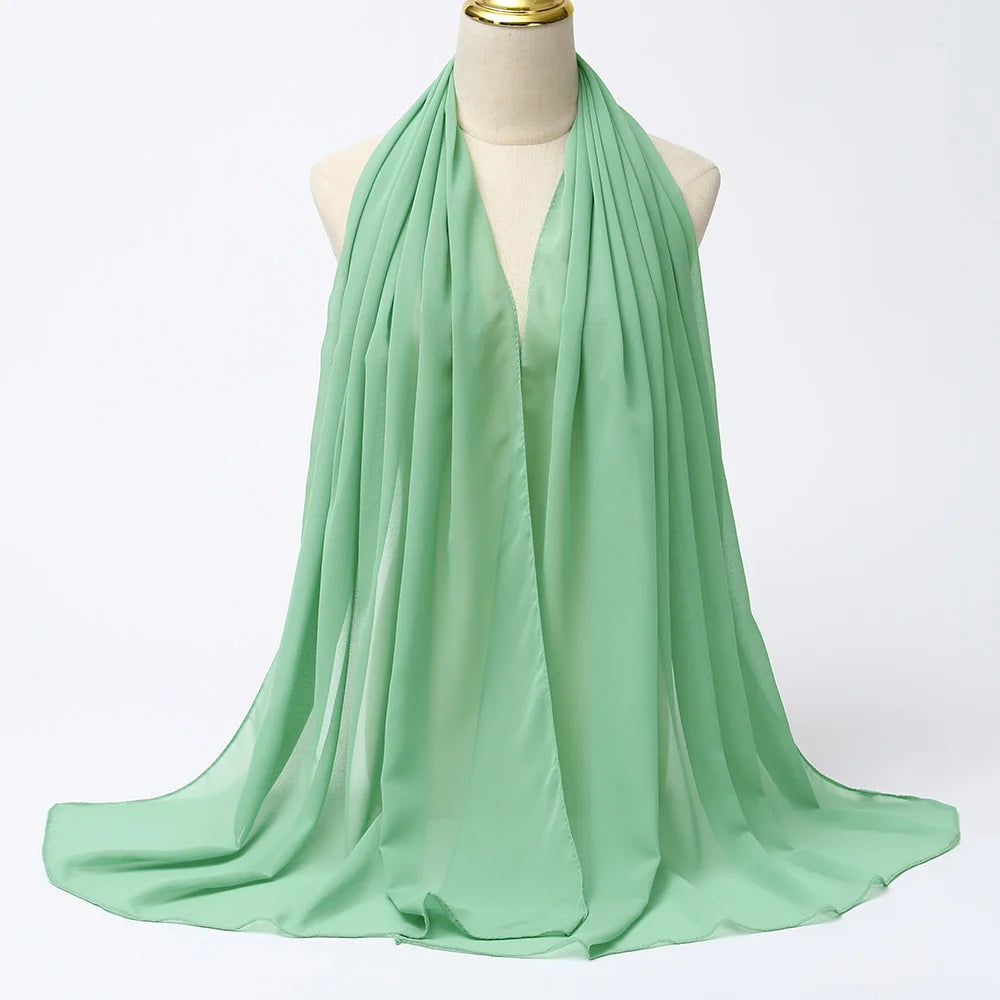 Long solid-color chiffon hijab — lightweight and elegant.