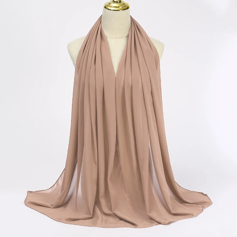 Long solid-color chiffon hijab — lightweight and elegant.