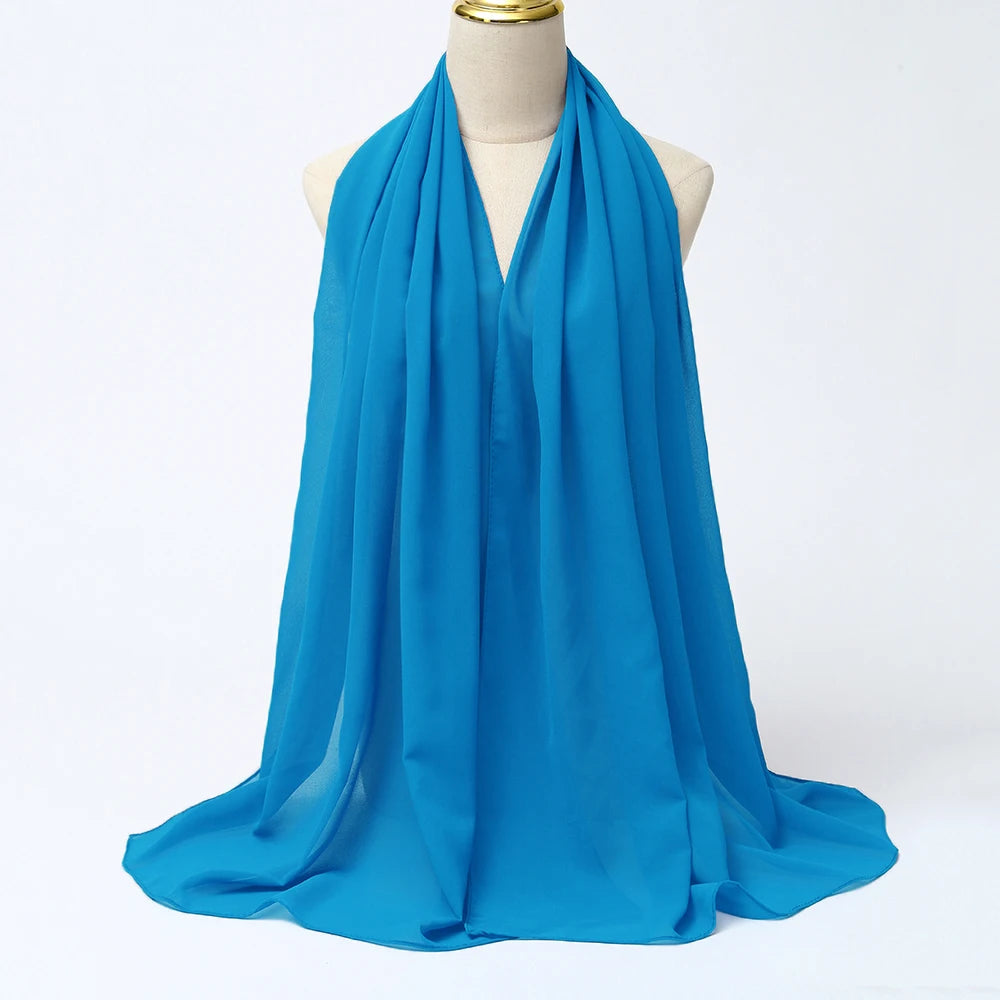 Long solid-color chiffon hijab — lightweight and elegant.