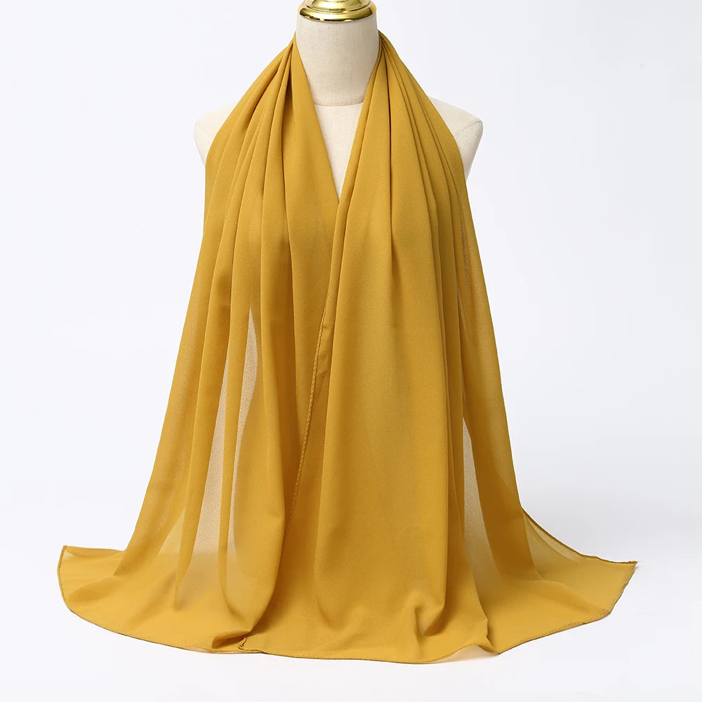 Long solid-color chiffon hijab — lightweight and elegant.
