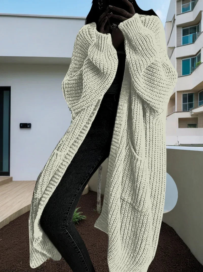 Oversized spring knitted V-neck cardigan.