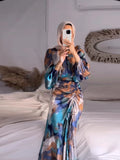 Printed long abaya/kaftan — elegant for Ramadan, Eid, and special occasions.