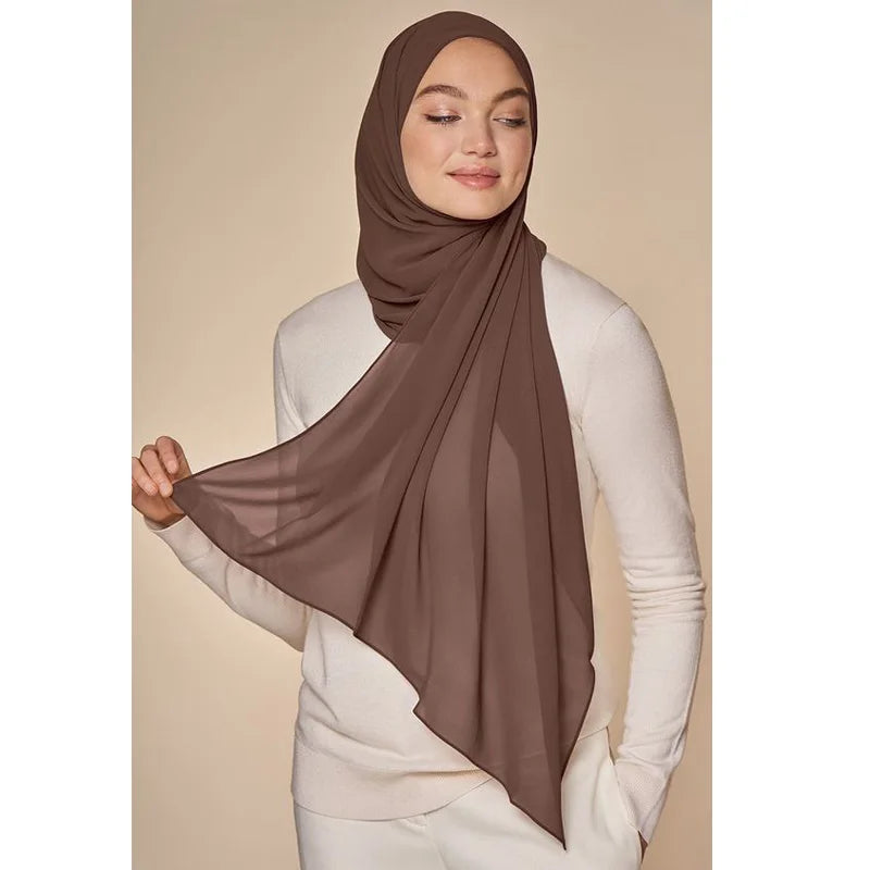 Long solid-color chiffon hijab — lightweight and elegant.