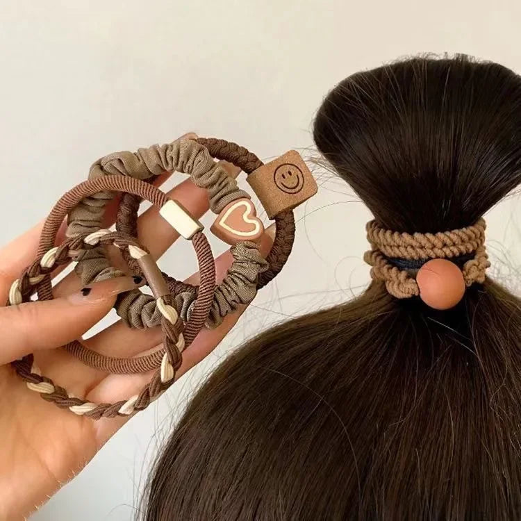 5-piece high-elastic seamless hair ties with cute bowknot — durable and crease-free.