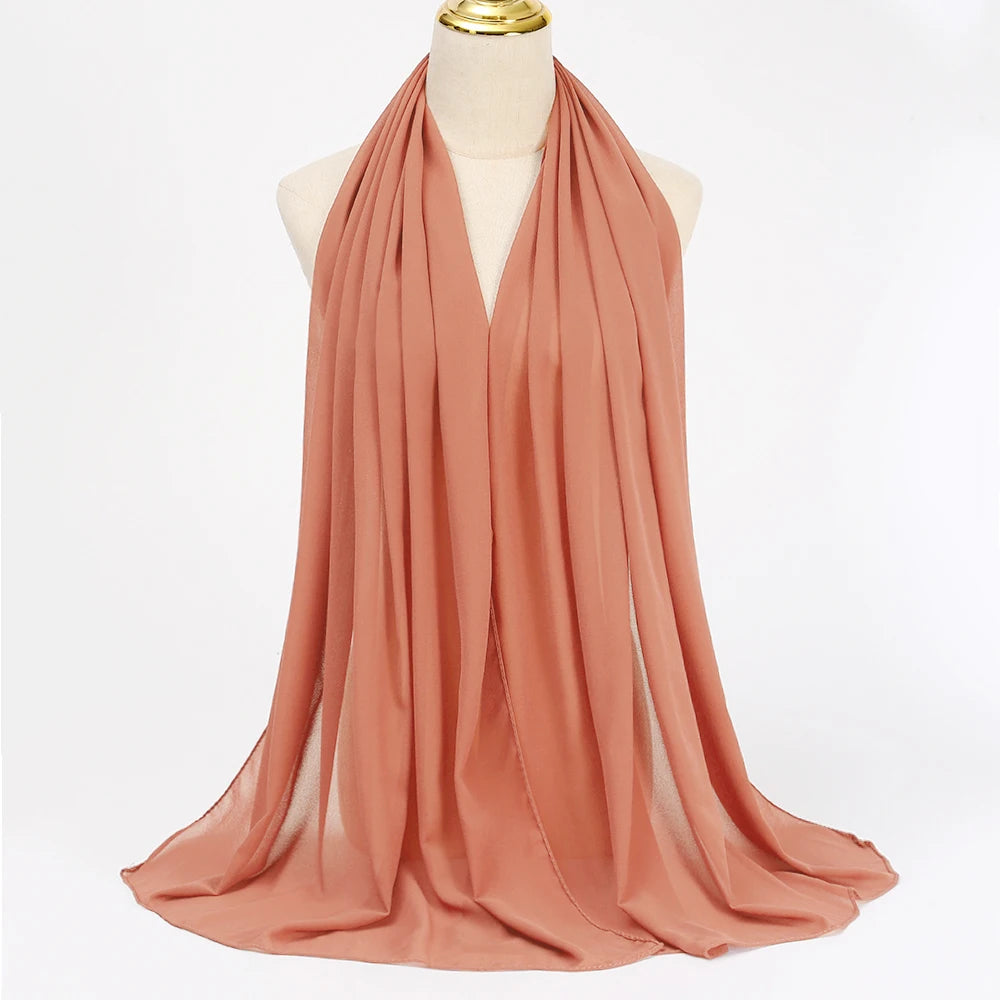 Long solid-color chiffon hijab — lightweight and elegant.
