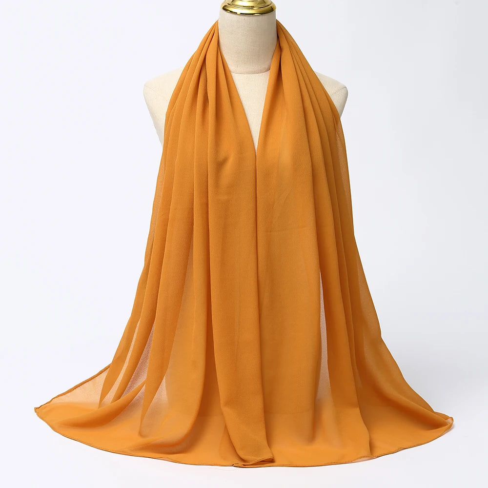 Long solid-color chiffon hijab — lightweight and elegant.
